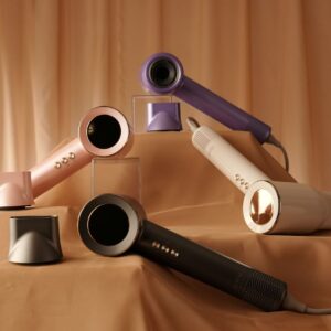 Colourful MY OHM Ultra+ hair dryers on display with accessories.