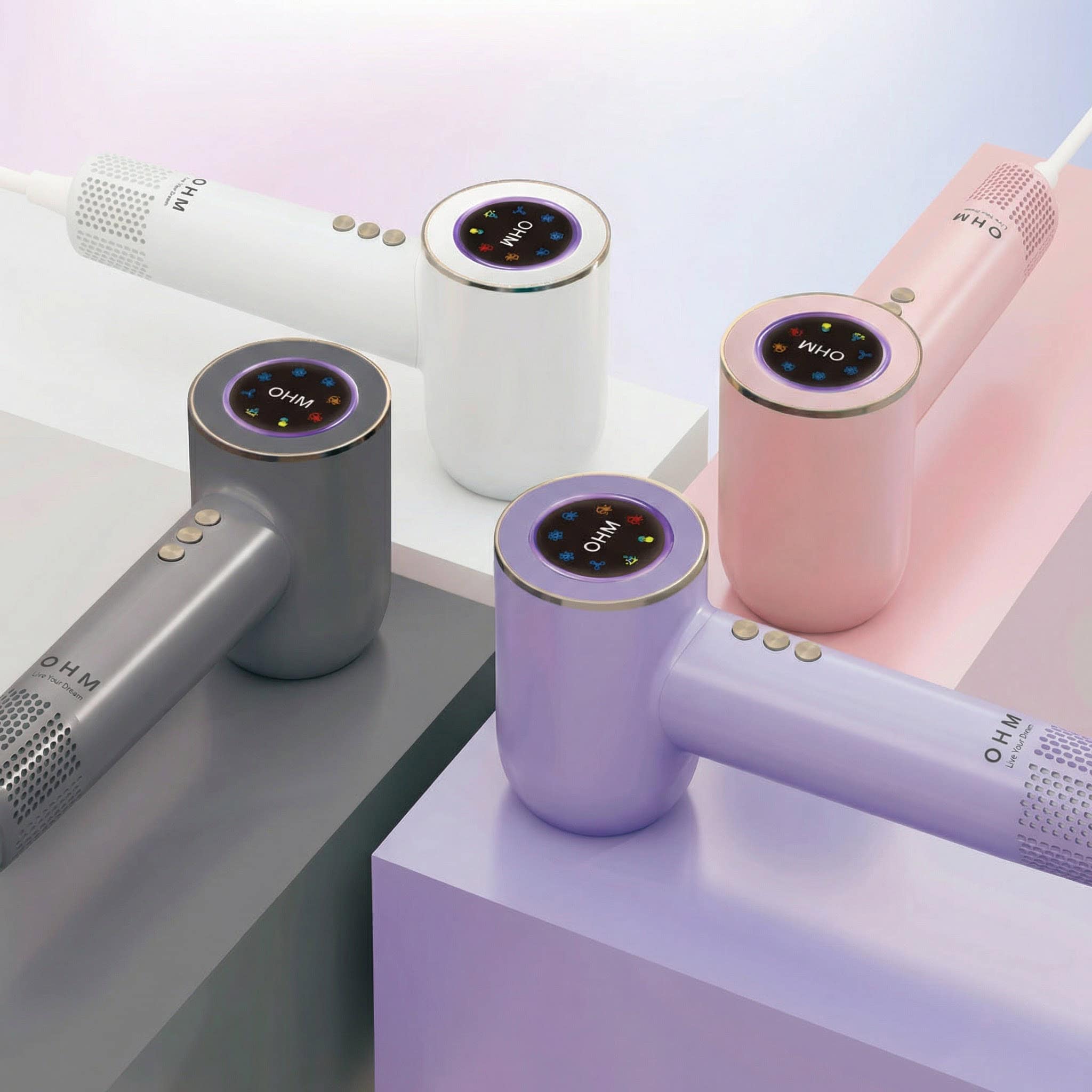 Stylish portable diffusers in pastel colours for home aromatherapy.